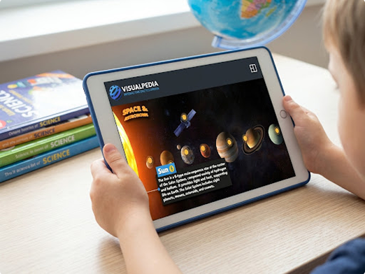A child using a tablet to explore Visualpedia